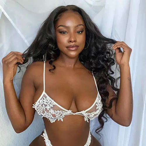 Tantra massage Las Vegas girl shows off skin and large bust in sexy bikini.